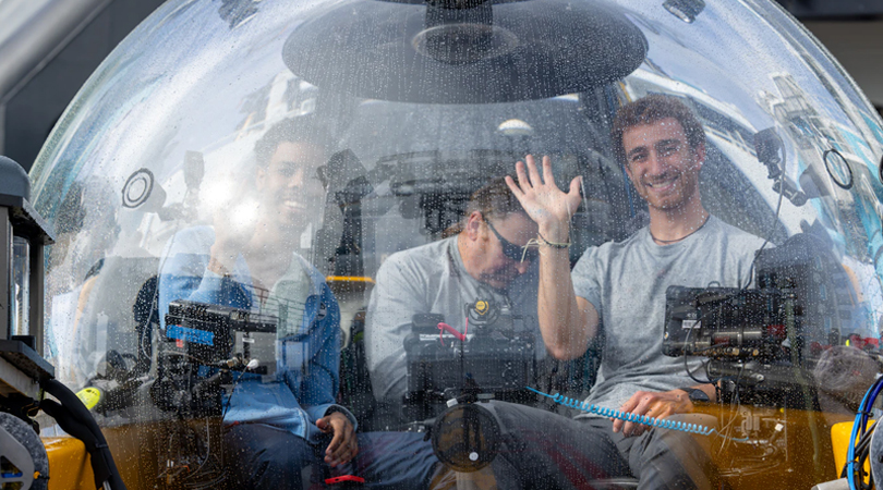Scientists sit within one of two submersibles in the OceanX fleet