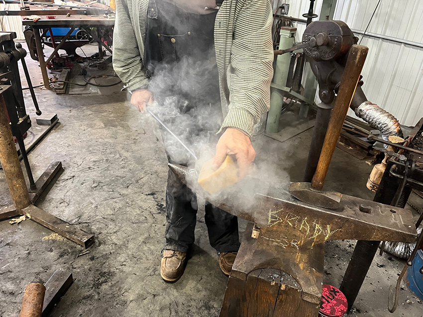 Beeswax is applied to a bell hook