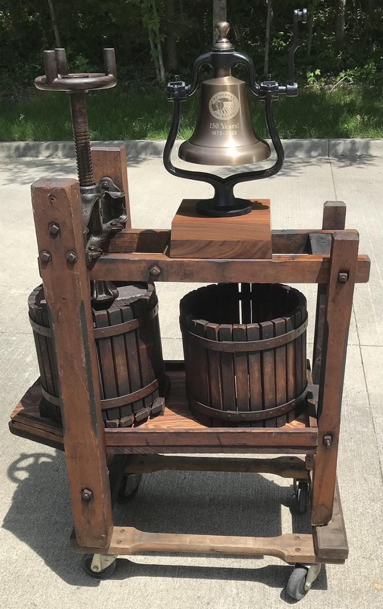 Brass bell on antique apple cider press at Rendleman Orchards