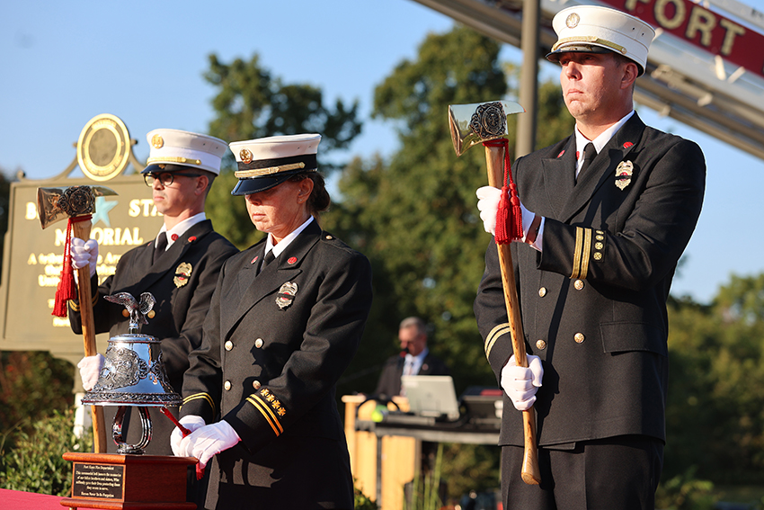 Members of the Fort Knox Fire Department toll a bell for those who lost their lives on Sept. 11, 2001