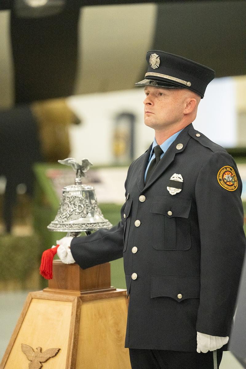 Brian Faas performs the ringing of the bell ceremony at the 22nd Anniversary 9/11 Memorial Service