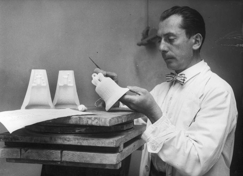 German sculptor Walter Lemcke in 1933 at work on the 1936 Berlin Olympic Bell