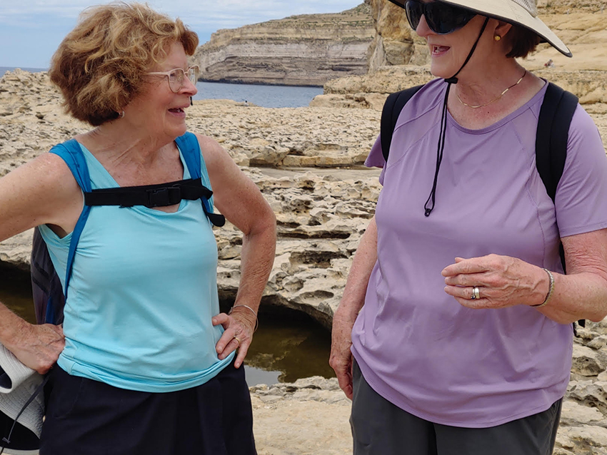 Handbell ringers Catherine McMichael, left, and Joyce Terry hike the island of Gozo in the Maltese archipelago