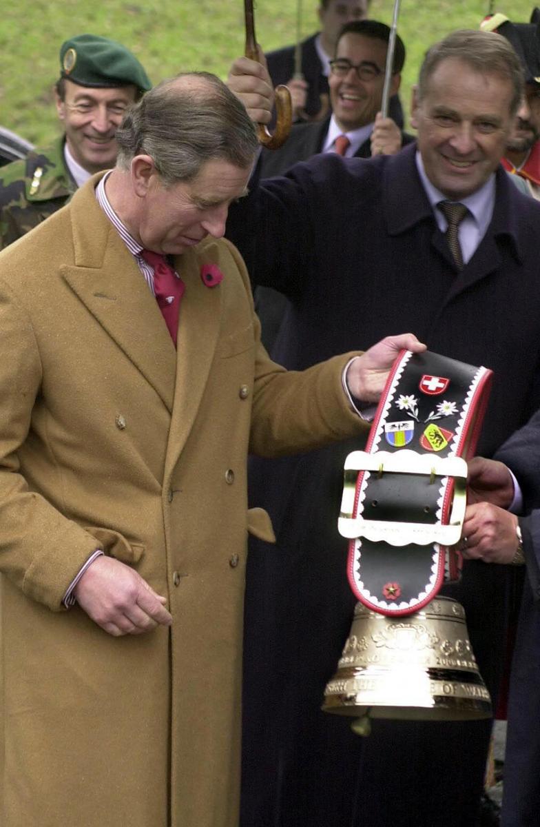 Prince of Wales receives a Swiss cowbell as a diplomatic gift