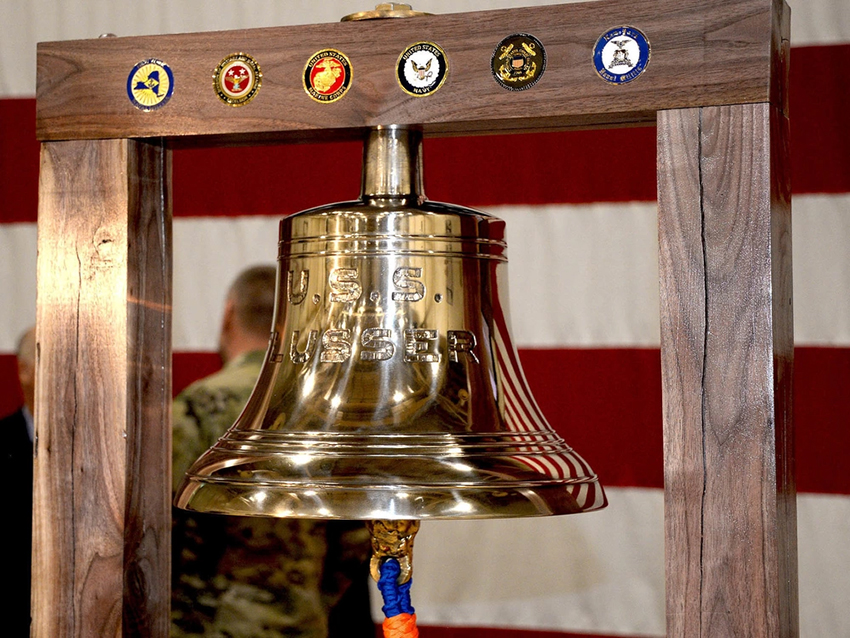Rededicating the ship's bell from the USS Flusser