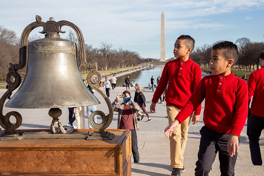 Boys observe the Fulton Bell on the steps of the Lincoln Memorial