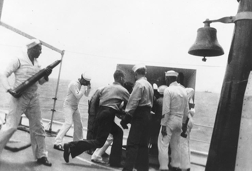 Ship's bell during gunnery exercise onboard the USS Isabel