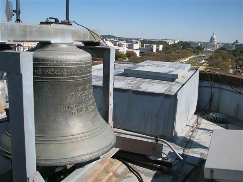 The Smithsonian bell and view down the National Mall from the Smithsonian Castle flag tower