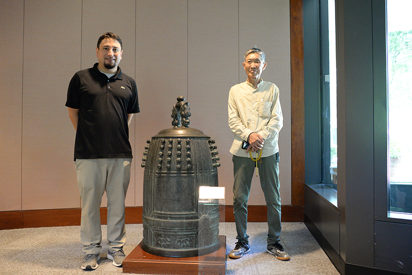 Yoshi Domoto and master carpenter Noritaka Kondo with Peace Bell